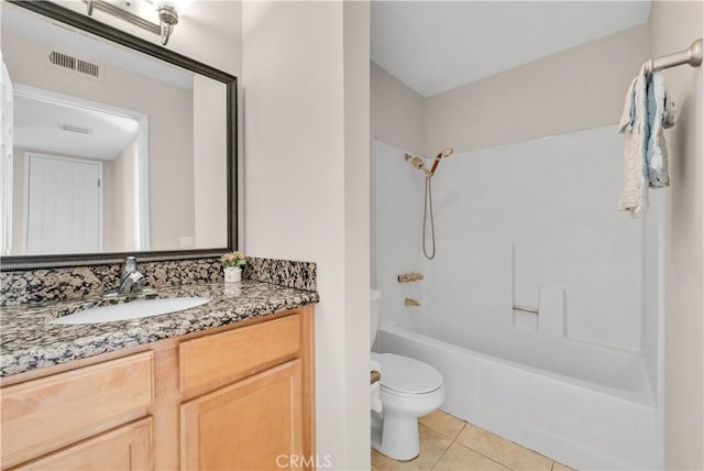 full bathroom with vanity, tile patterned floors, bathing tub / shower combination, and toilet