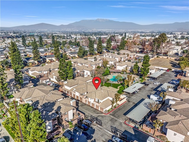 drone / aerial view featuring a mountain view