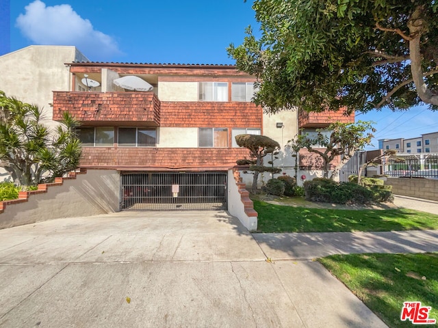 view of property featuring a garage