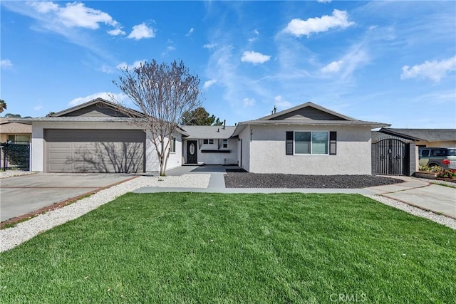 ranch-style home featuring a front lawn, concrete driveway, an attached garage, and stucco siding