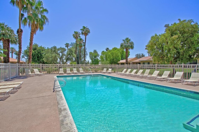 view of swimming pool featuring a patio