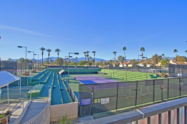 view of sport court with a mountain view