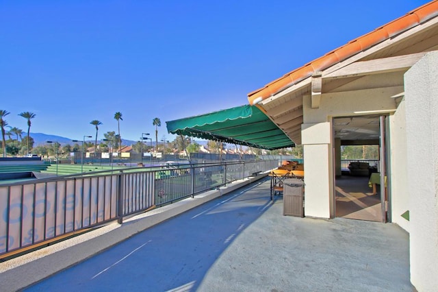 view of patio / terrace featuring a mountain view