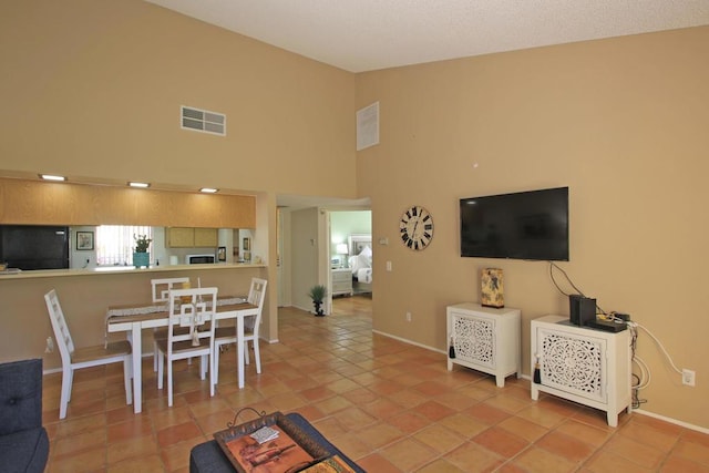 interior space featuring high vaulted ceiling