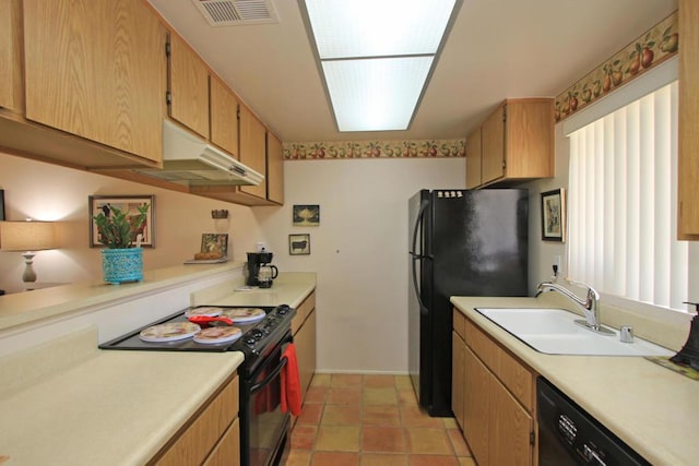 kitchen with sink, light tile patterned floors, and black appliances