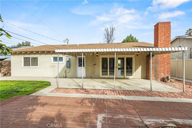 rear view of house featuring a patio