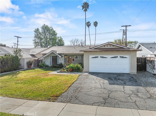 ranch-style house with a garage and a front yard