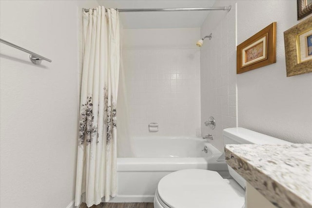 bathroom with toilet and shower / bath combo with shower curtain