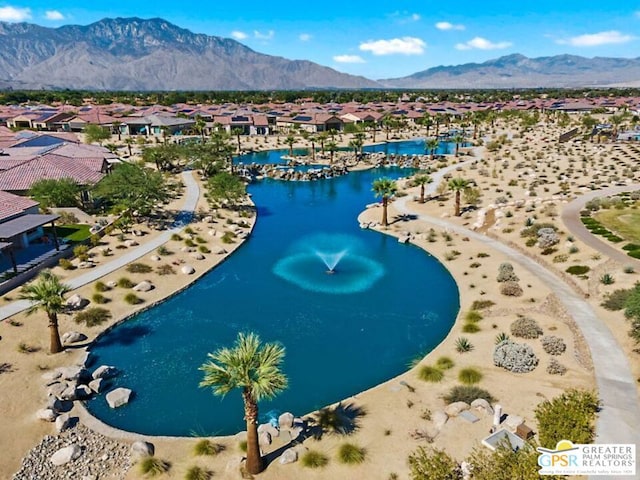 bird's eye view featuring a water and mountain view