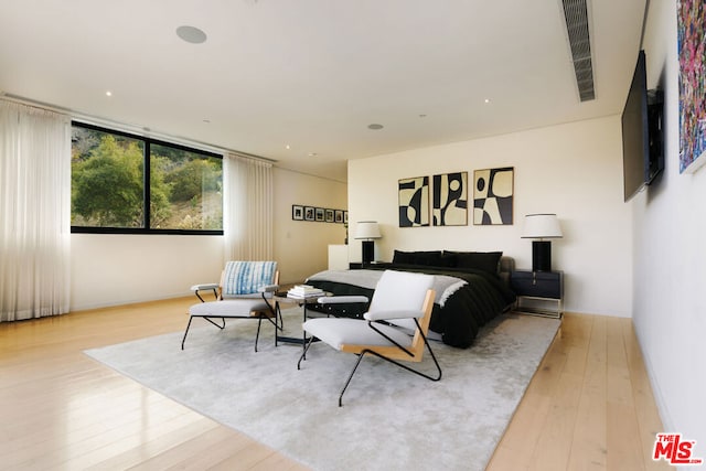 bedroom featuring light hardwood / wood-style floors