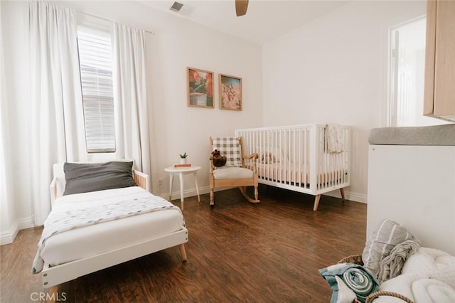 bedroom featuring wood-type flooring and ceiling fan