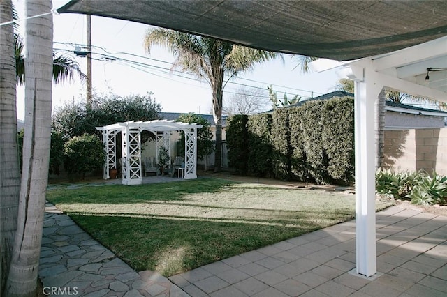 view of yard featuring a pergola and a patio