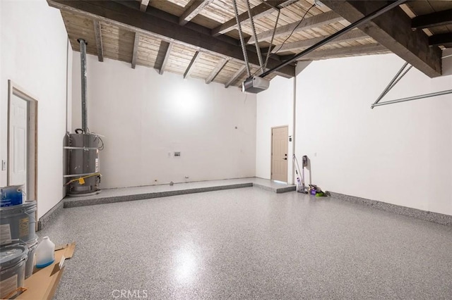 garage with wooden ceiling, a garage door opener, and secured water heater