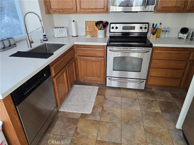 kitchen featuring sink and stainless steel appliances