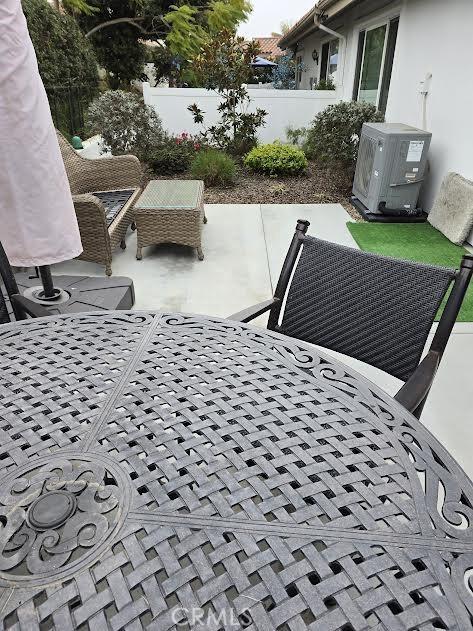 view of patio featuring ac unit