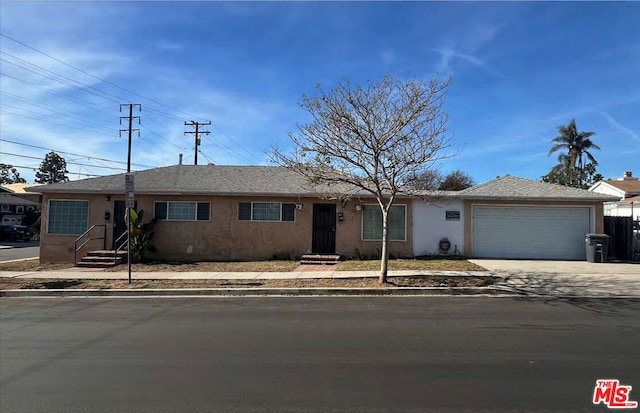 single story home with a garage