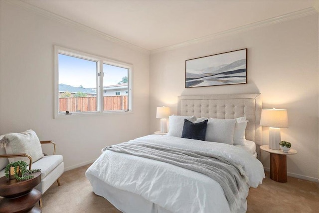 carpeted bedroom with crown molding