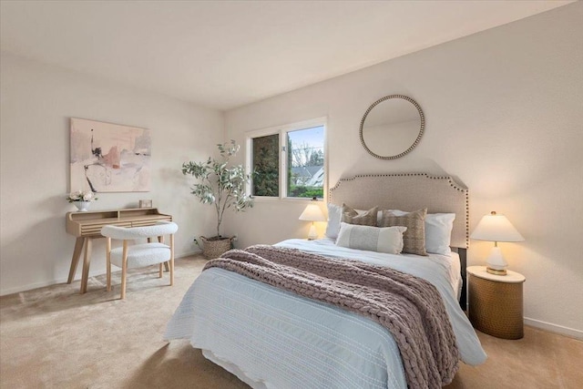 bedroom with light colored carpet