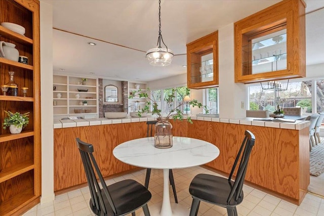 dining space featuring built in features