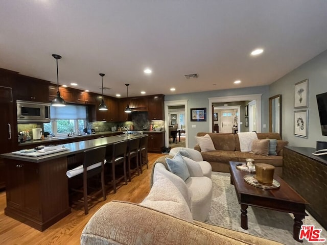 living room with light wood-type flooring