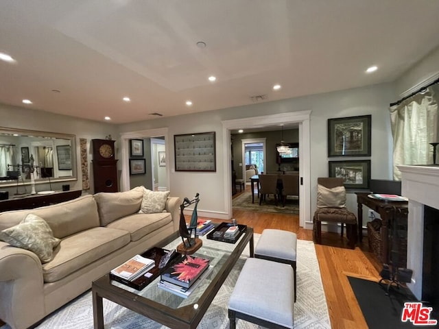 living room with light hardwood / wood-style floors