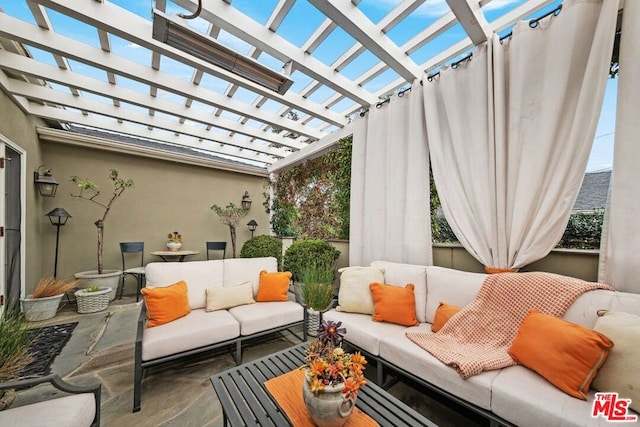 view of patio / terrace with an outdoor hangout area and a pergola