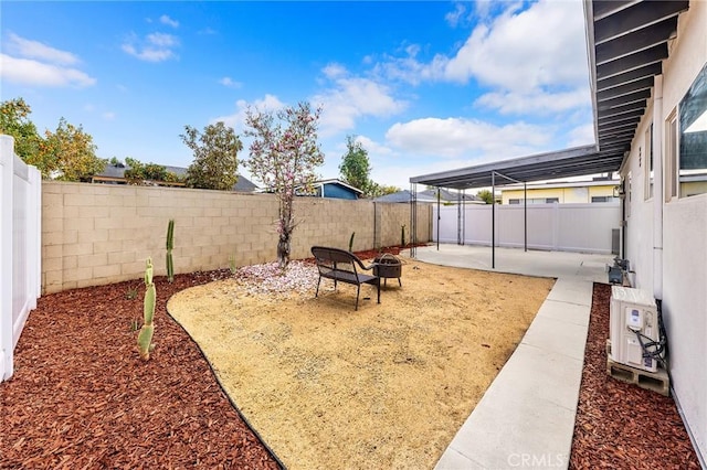 view of yard with a patio and ac unit