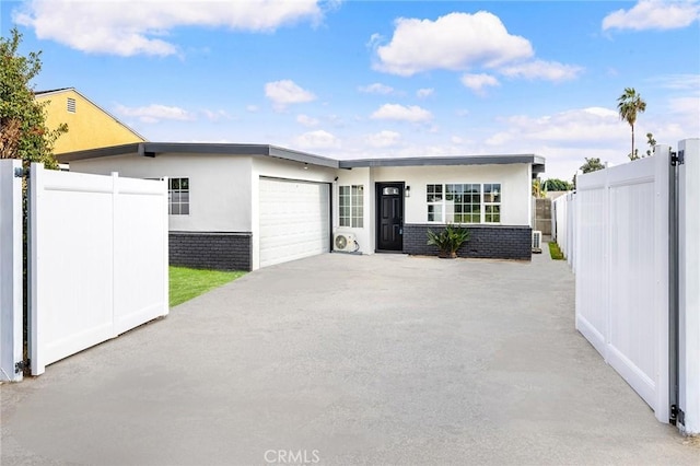 ranch-style home with a garage