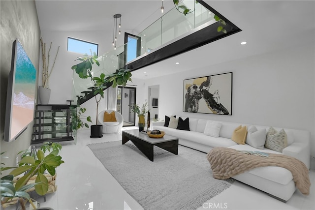 living room with a high ceiling