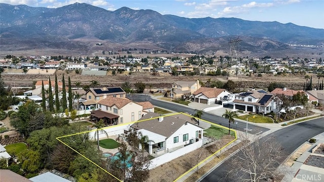 drone / aerial view featuring a mountain view