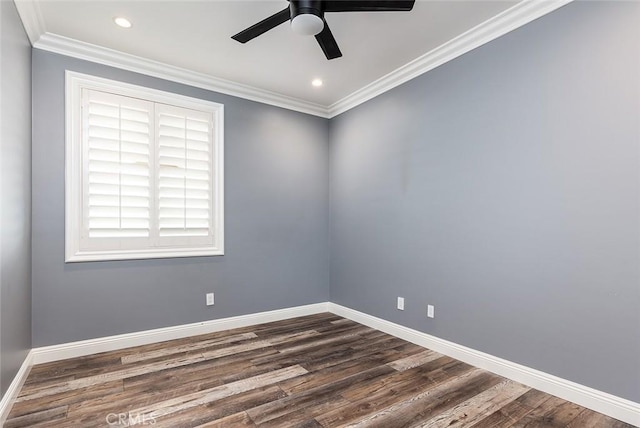 empty room featuring dark wood-type flooring, ornamental molding, and ceiling fan