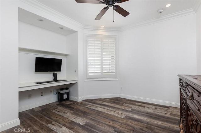 unfurnished living room featuring crown molding, dark hardwood / wood-style floors, built in desk, and ceiling fan