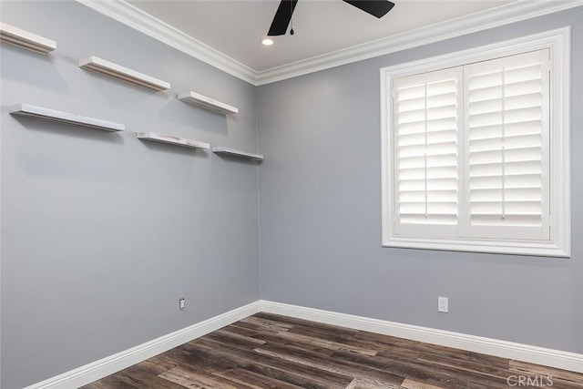 empty room featuring ceiling fan, ornamental molding, and dark hardwood / wood-style flooring