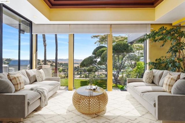 sunroom / solarium featuring a wealth of natural light