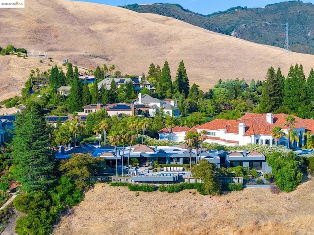 bird's eye view with a mountain view