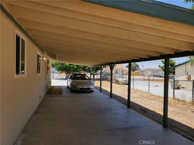 view of parking featuring a carport