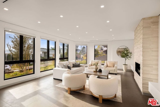 living room featuring a fireplace