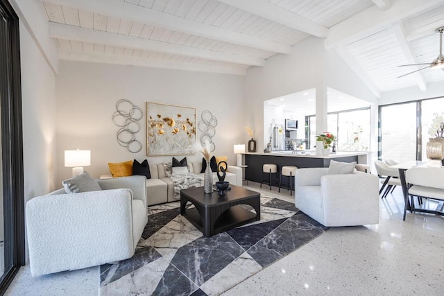 living room featuring lofted ceiling with beams, ceiling fan, and wood ceiling