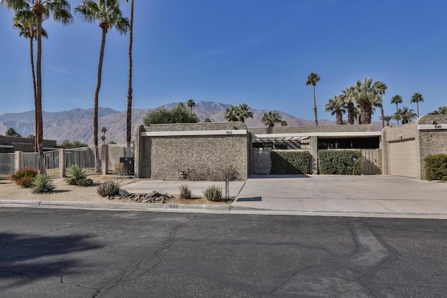 view of front of property with a mountain view