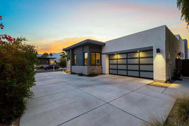 modern home featuring a garage