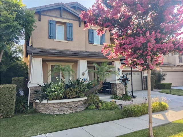 craftsman house with a garage