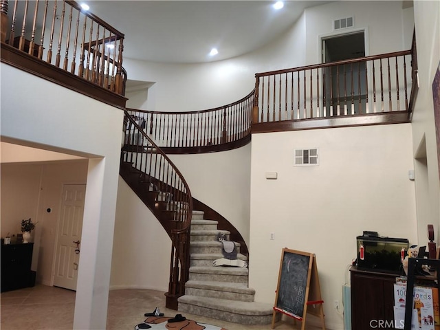 stairway with a high ceiling