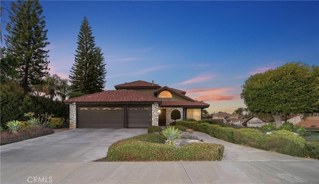 view of front of home with a garage