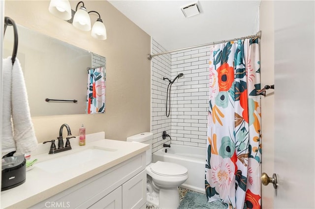 full bathroom with vanity, shower / bath combo, and toilet