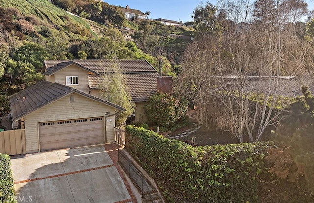 view of front of property with a garage