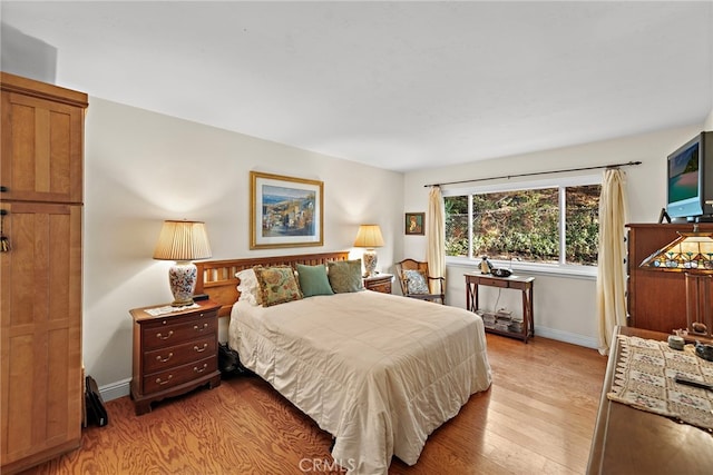 bedroom featuring light wood-type flooring