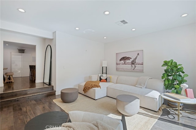 living room with hardwood / wood-style flooring