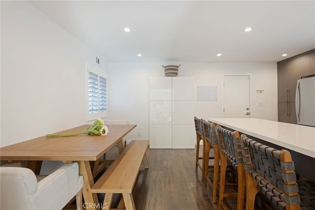 dining room with dark wood-type flooring