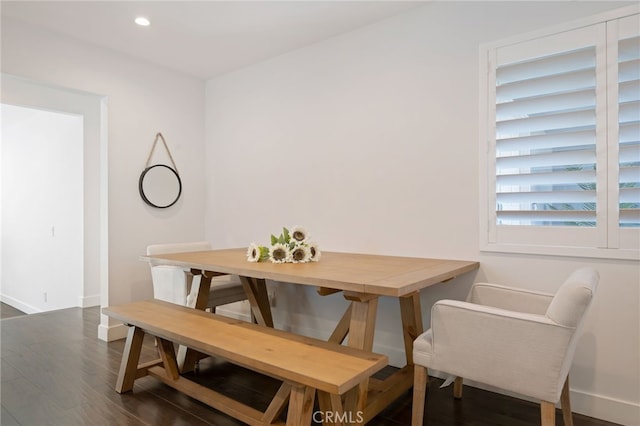 dining area featuring dark hardwood / wood-style floors