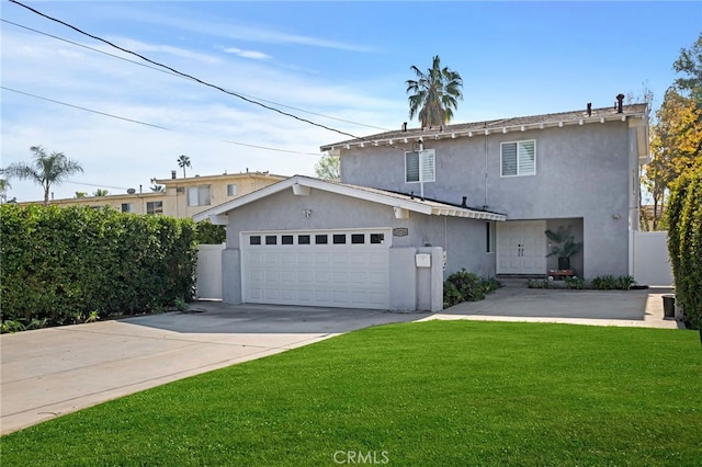 view of front facade featuring a garage and a front lawn